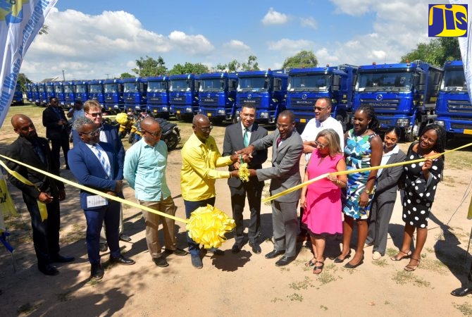 PM Hands Over 50 New Trucks to NSWMA